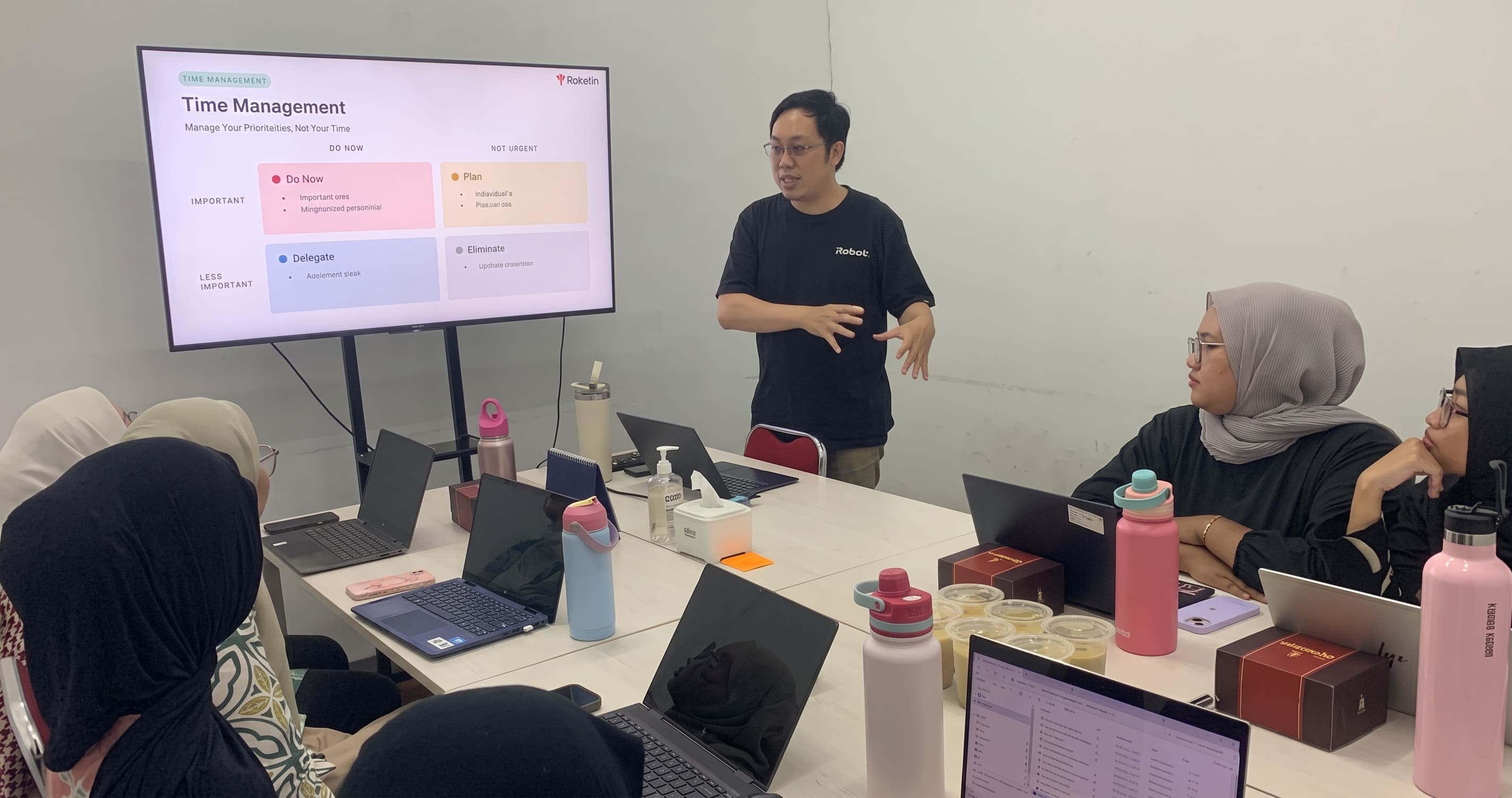 Roketin CEO Tony Darmasaputra leading a workplace standards training session